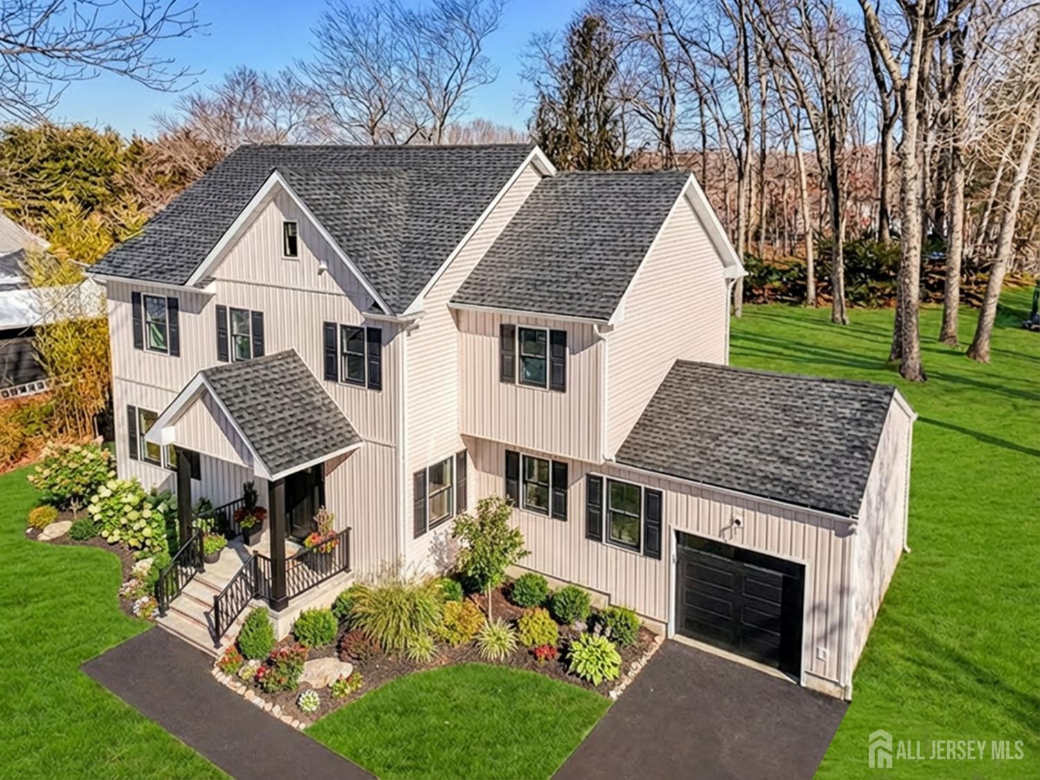 290 Fresh Ponds Road North Brunswick, NJ 08902 - Photo 1 of 44 a view of a yard in front of house