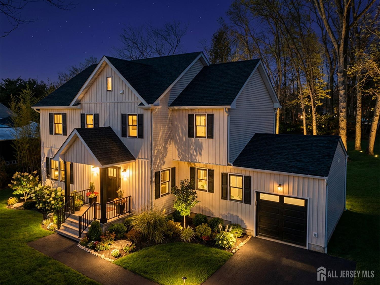 290 Fresh Ponds Road North Brunswick, NJ 08902 - Photo 2 of 44 a front view of a house with a yard