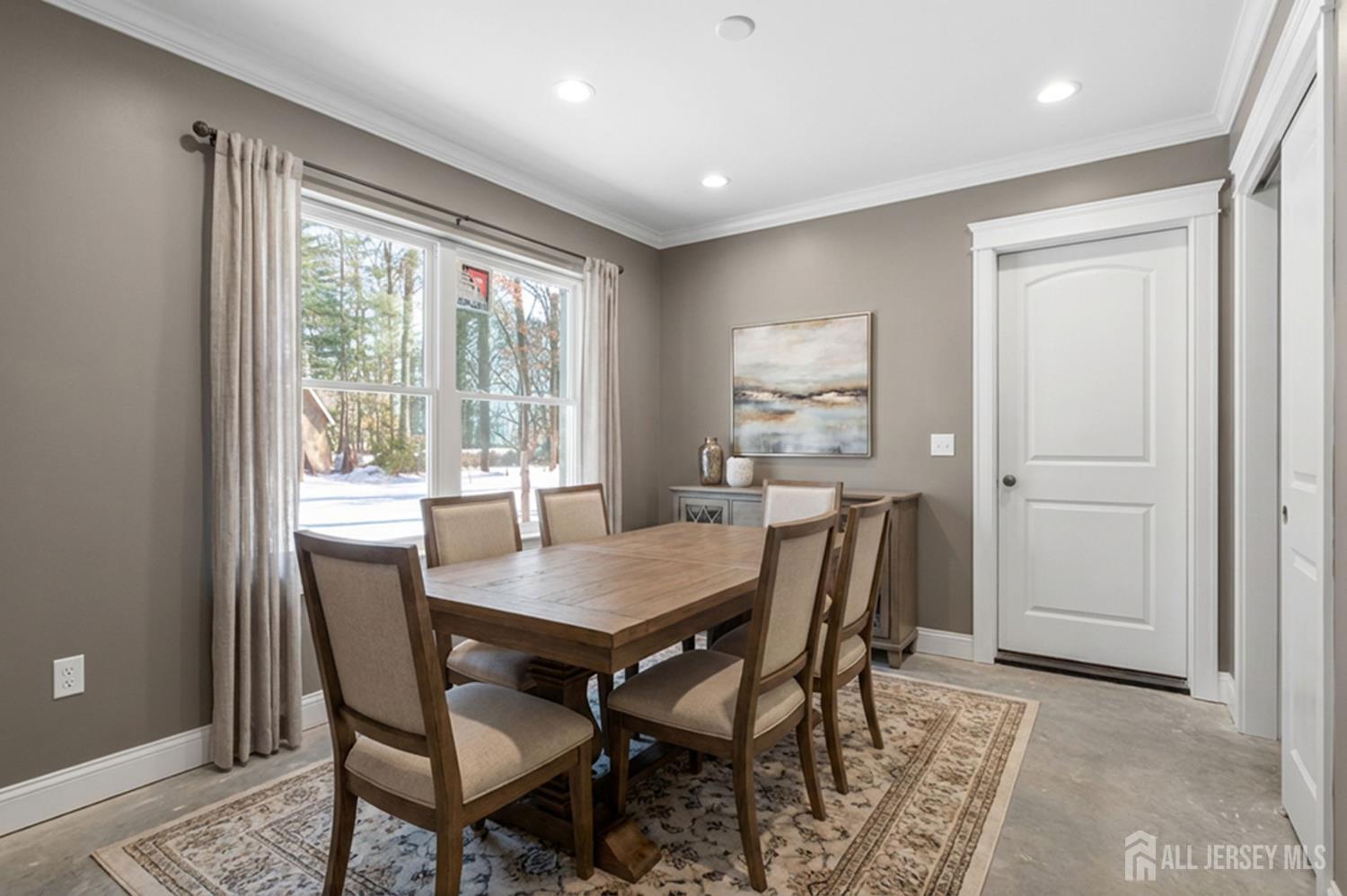 290 Fresh Ponds Road North Brunswick, NJ 08902 - Photo 33 of 44 a view of a dining room with furniture window and wooden floor