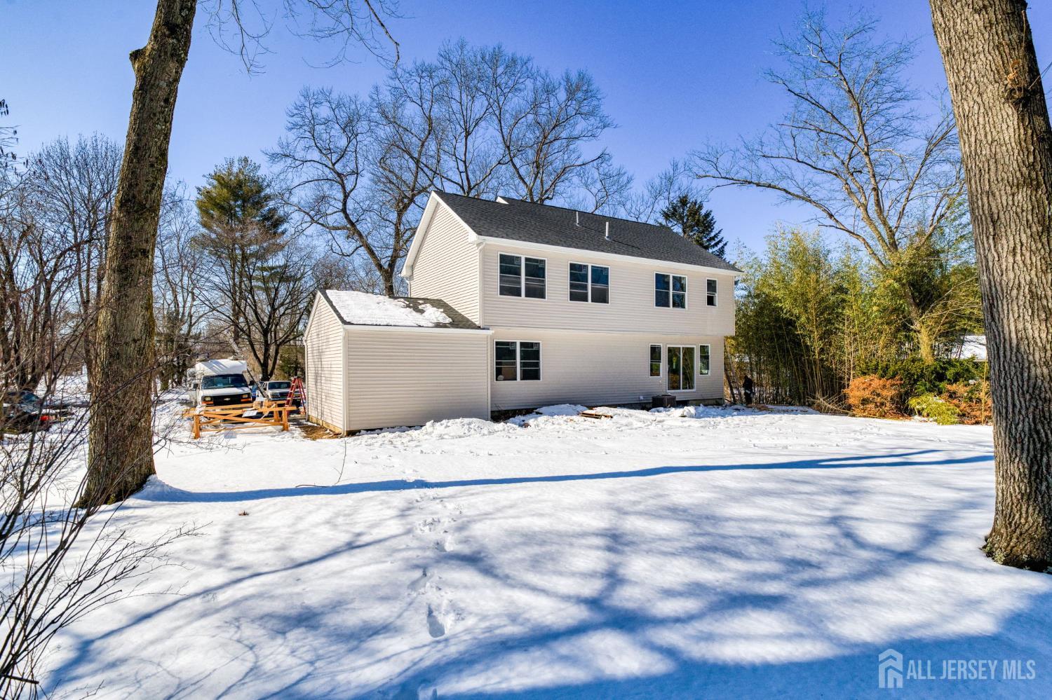 290 Fresh Ponds Road North Brunswick, NJ 08902 - Photo 37 of 44 a front view of a house with a yard