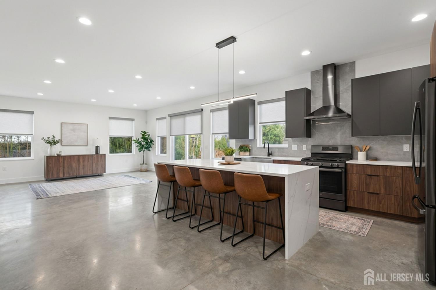 290 Fresh Ponds Road North Brunswick, NJ 08902 - Photo 10 of 44 a kitchen with stainless steel appliances kitchen island granite countertop a sink and cabinets