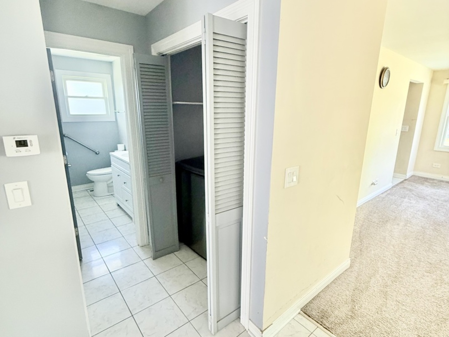 8356 South 78th Avenue Bridgeview, IL 60455 - Photo 11 of 39 a view of a bathroom from a hallway