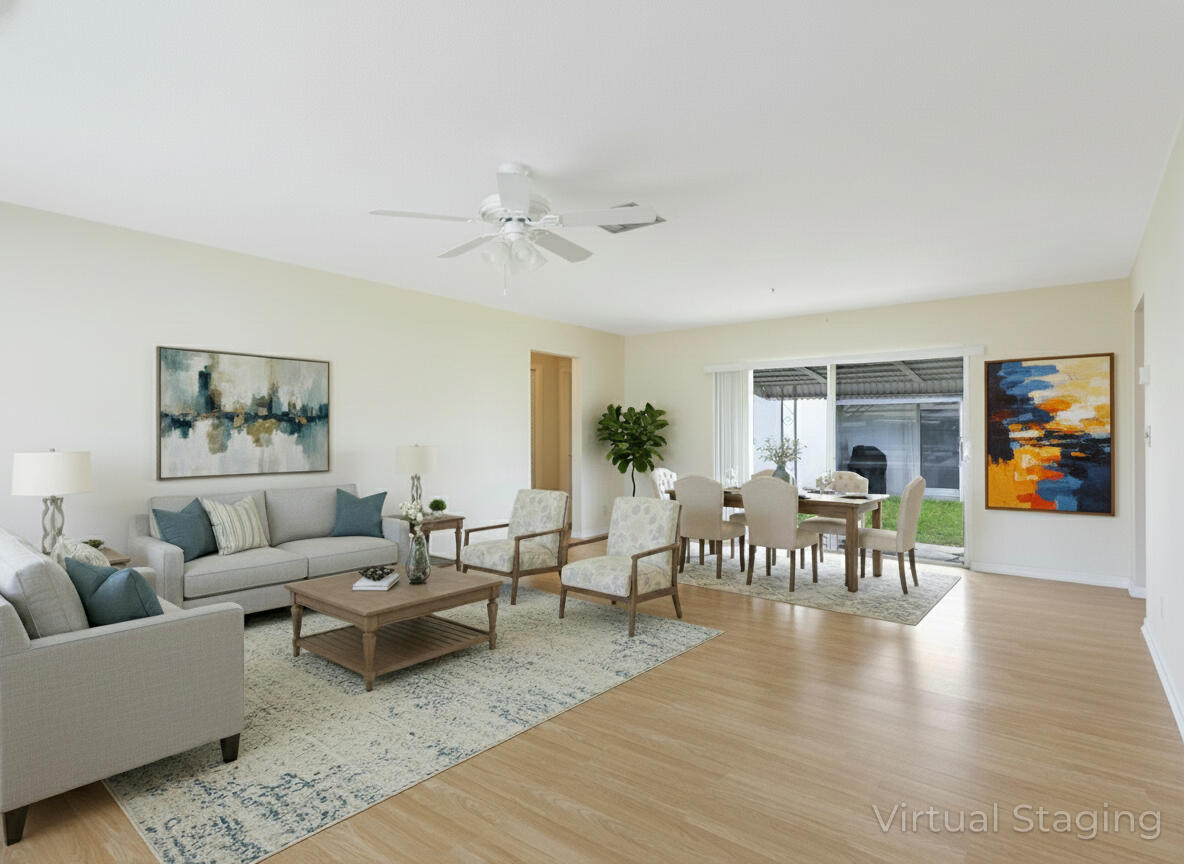 127 Leisureville Boulevard Boynton Beach, FL 33426 - Photo 4 of 23 a living room with furniture and wooden floor