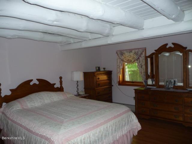 51 Madden Road Hancock, MA 01237 - Photo 13 of 19 a bedroom with a bed and a dresser