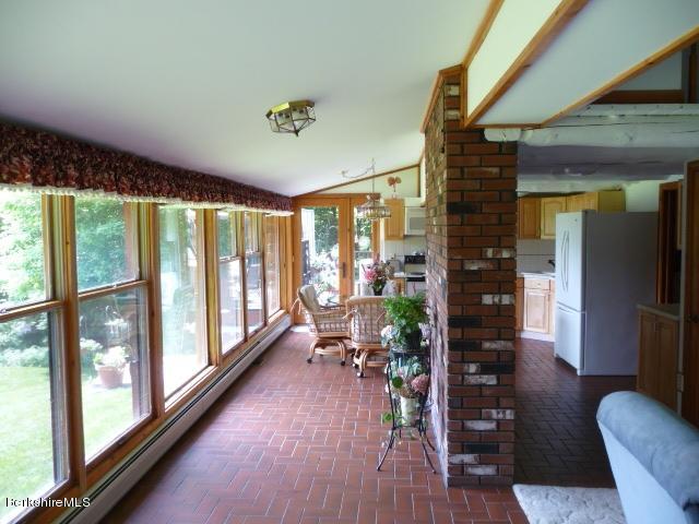 51 Madden Road Hancock, MA 01237 - Photo 7 of 19 a living room with furniture and a large window