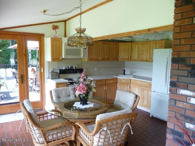51 Madden Road Hancock, MA 01237 - Photo 8 of 19 a dining room with furniture and wooden floor