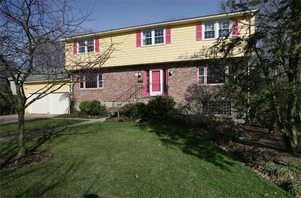 19 Priscilla Road Newton, MA 02467 - Photo 1 of 1 a front view of a house with garden