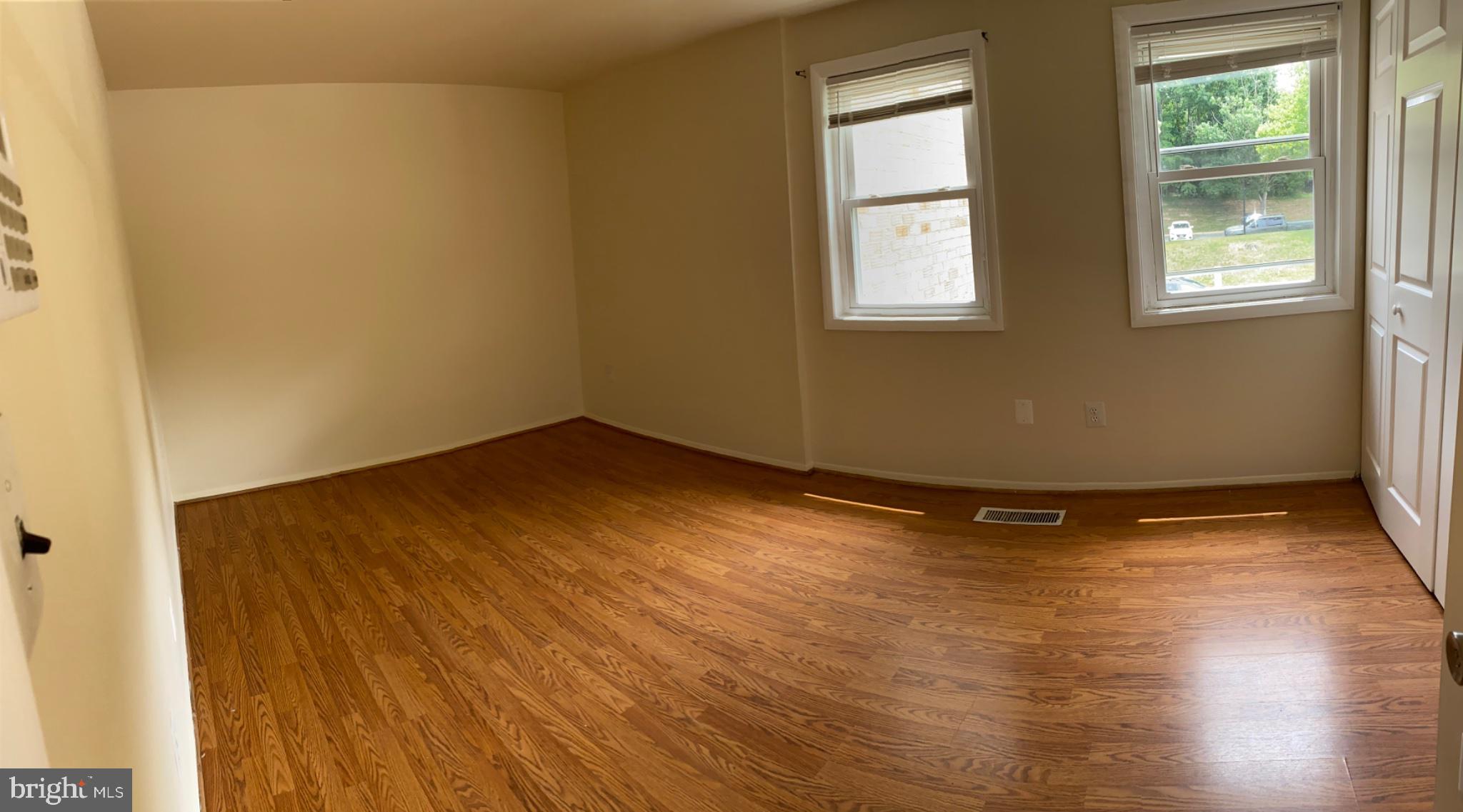 9323 Matador Road Columbia, MD 21045 - Photo 13 of 22 Bright and airy room with hardwood floors.