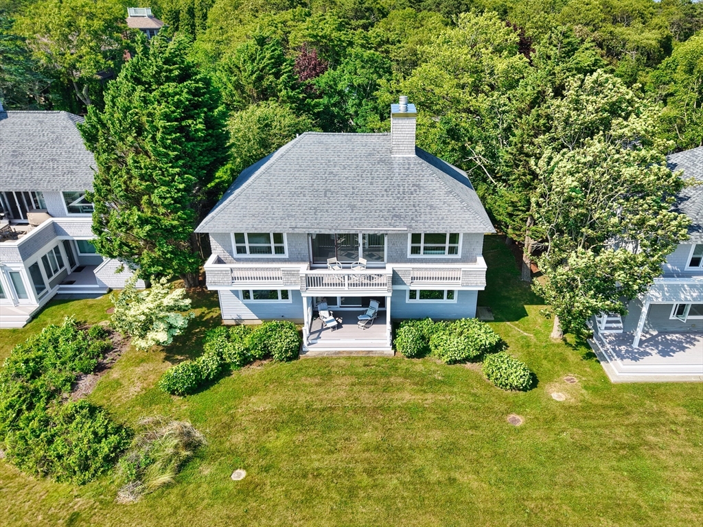 34 North Shore Drive, Unit 3 Dartmouth, MA 02748 - Photo 2 of 34 a house view with a garden space