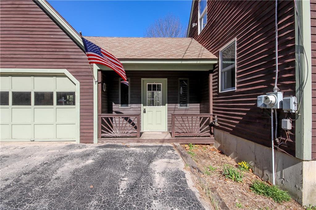 137 Convene Road Sebago, ME 04029 - Photo 4 of 35 Covered breezeway with sunburst...