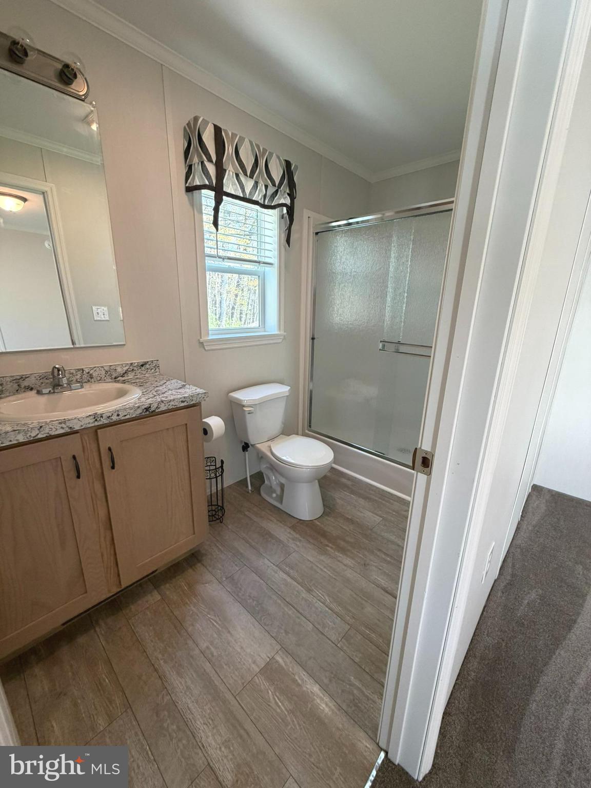 365 East Cherry Road Quakertown, PA 18951 - Photo 17 of 51 a bathroom with a sink a toilet a mirror and shower