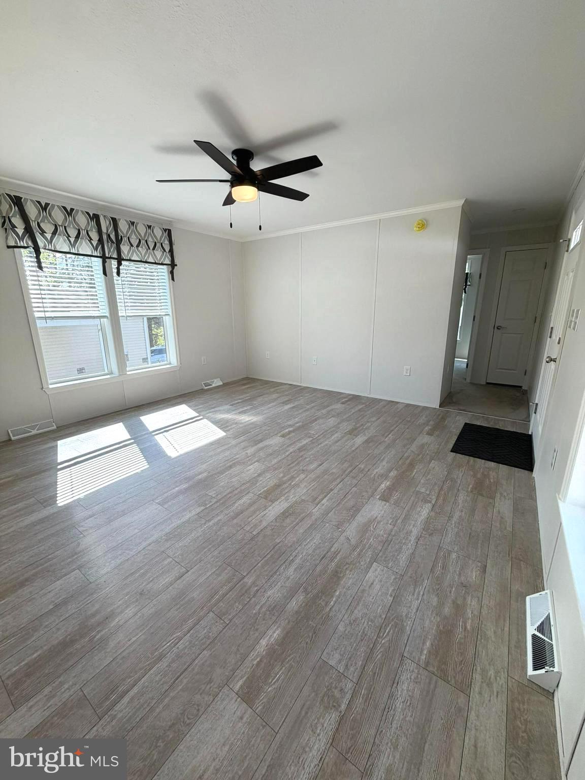 365 East Cherry Road Quakertown, PA 18951 - Photo 19 of 51 a view of an empty room with a window and wooden floor