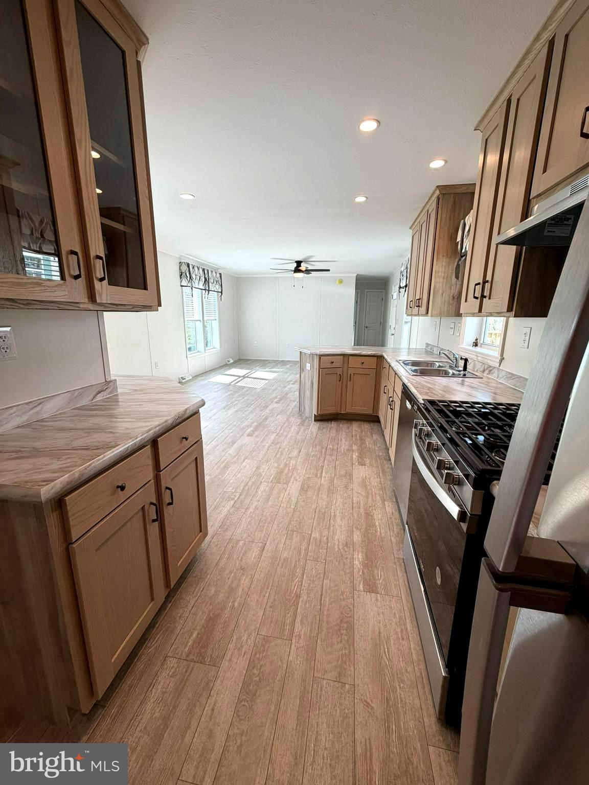 365 East Cherry Road Quakertown, PA 18951 - Photo 24 of 51 a kitchen with stainless steel appliances granite countertop a stove and a sink