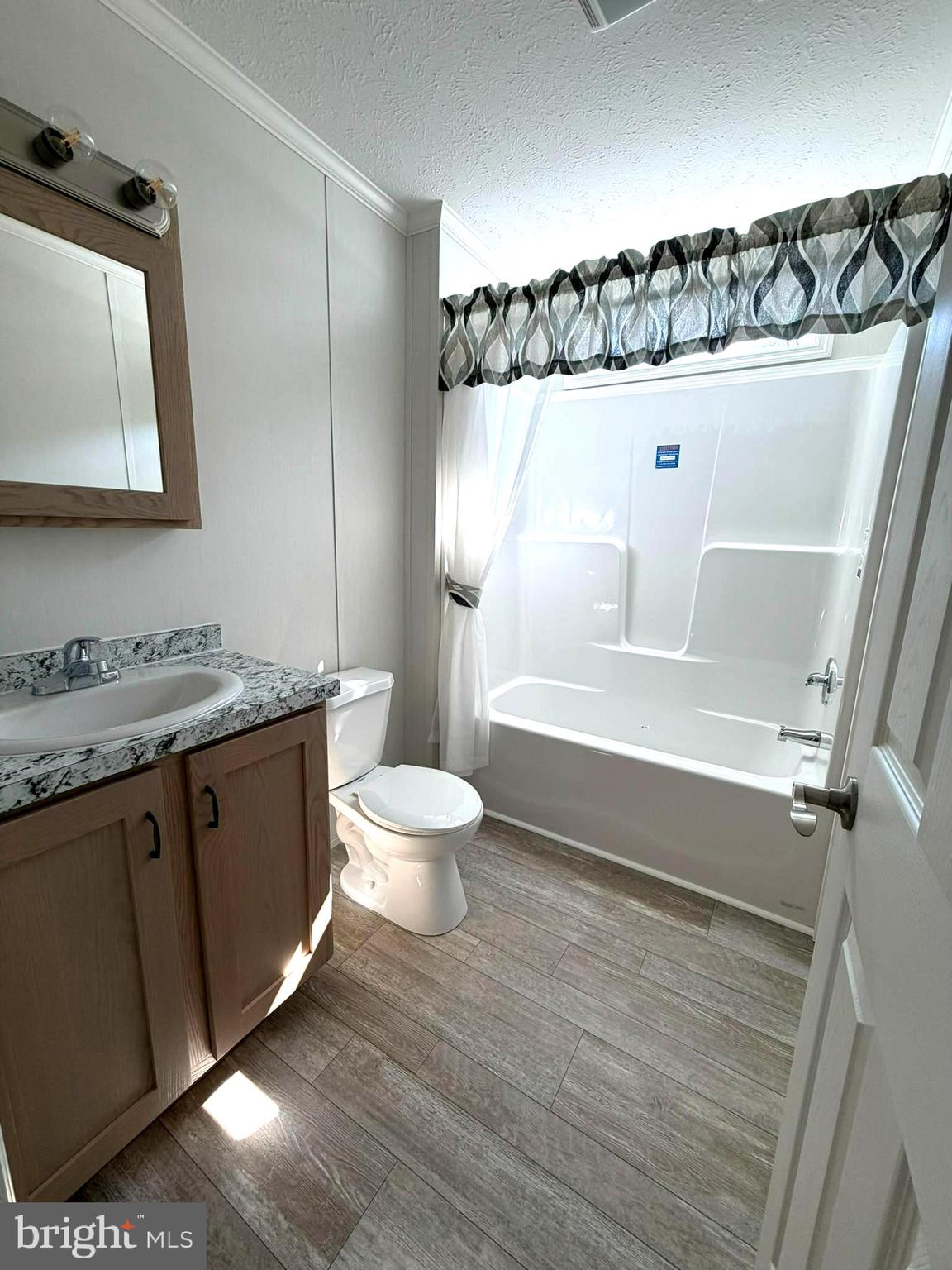 365 East Cherry Road Quakertown, PA 18951 - Photo 26 of 51 a bathroom with a granite countertop sink a toilet and bathtub