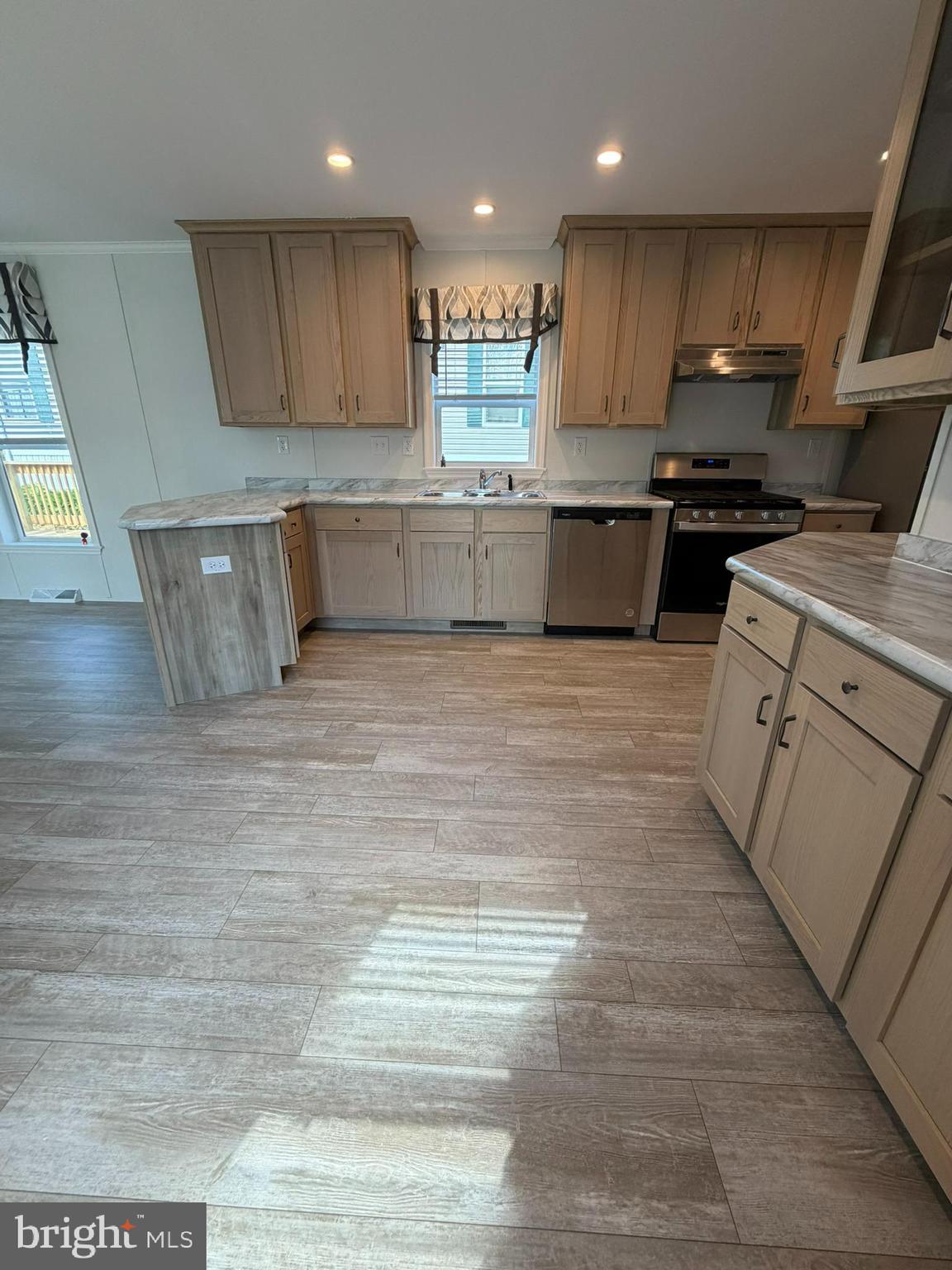 365 East Cherry Road Quakertown, PA 18951 - Photo 5 of 51 a kitchen with stainless steel appliances granite countertop a sink and a stove
