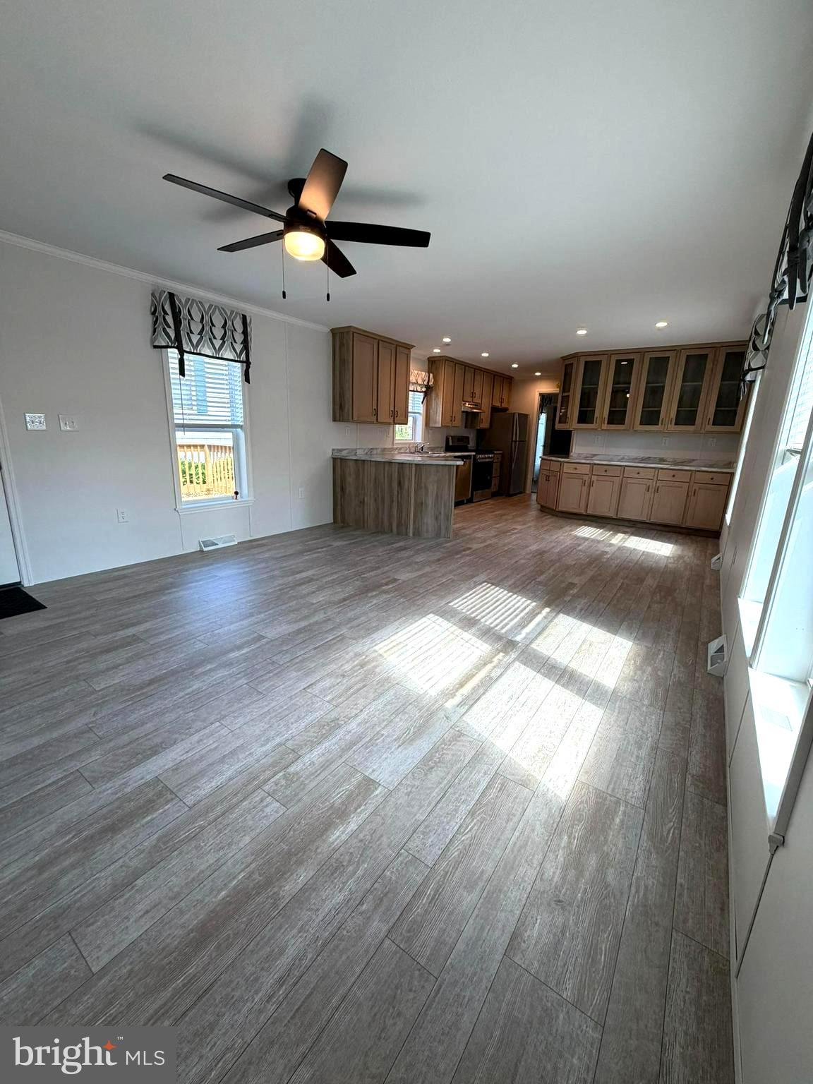365 East Cherry Road Quakertown, PA 18951 - Photo 6 of 51 a view of empty room with wooden floor and fan
