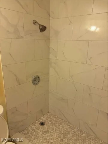 a view of a street with cars park