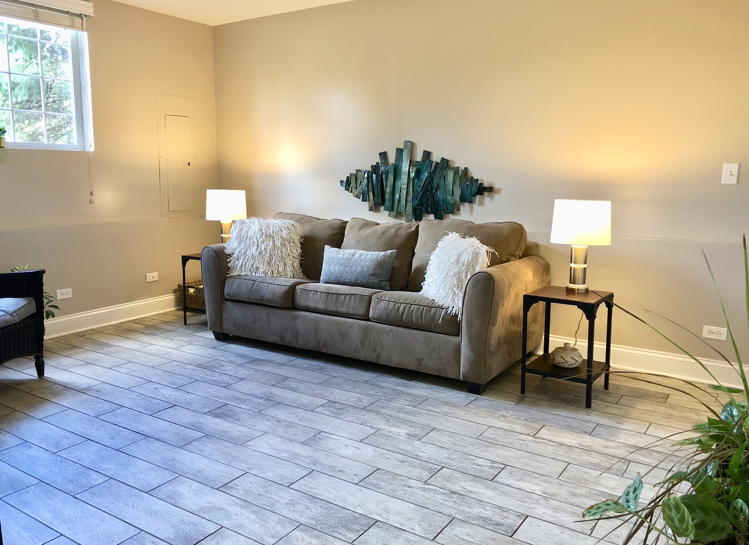 S020 Kerry Court Winfield, IL 60190 - Photo 23 of 23 a living room with couches and a coffee table with wooden floor