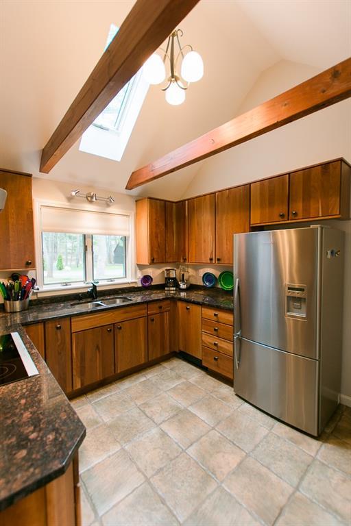 24 Cluf Bay Road, Unit 24 Brunswick, ME 04011 - Photo 8 of 35 A cathedral ceiling and skylights...