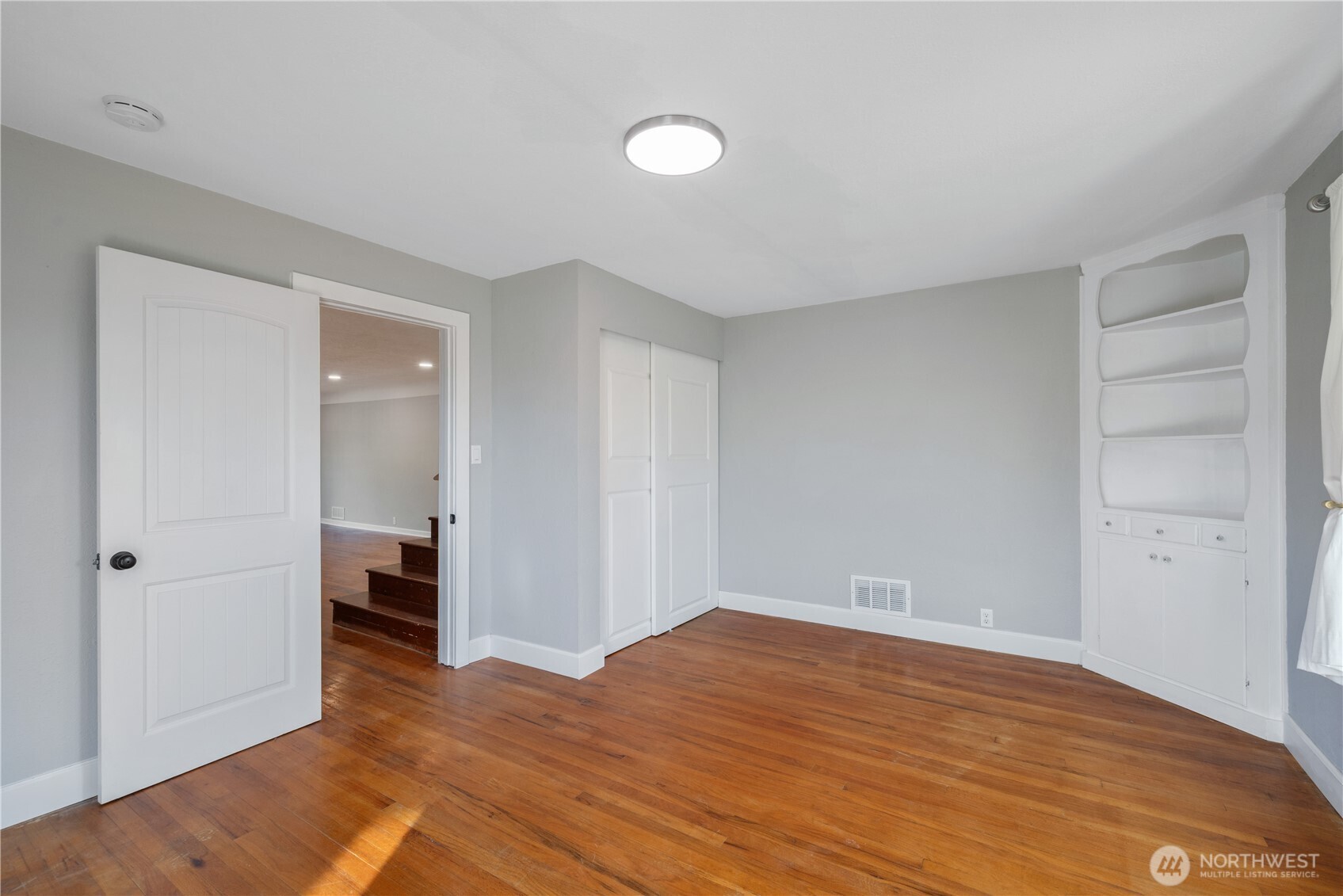 2 Country Club Drive Longview, WA 98632 - Photo 11 of 40 a view of empty room with wooden floor