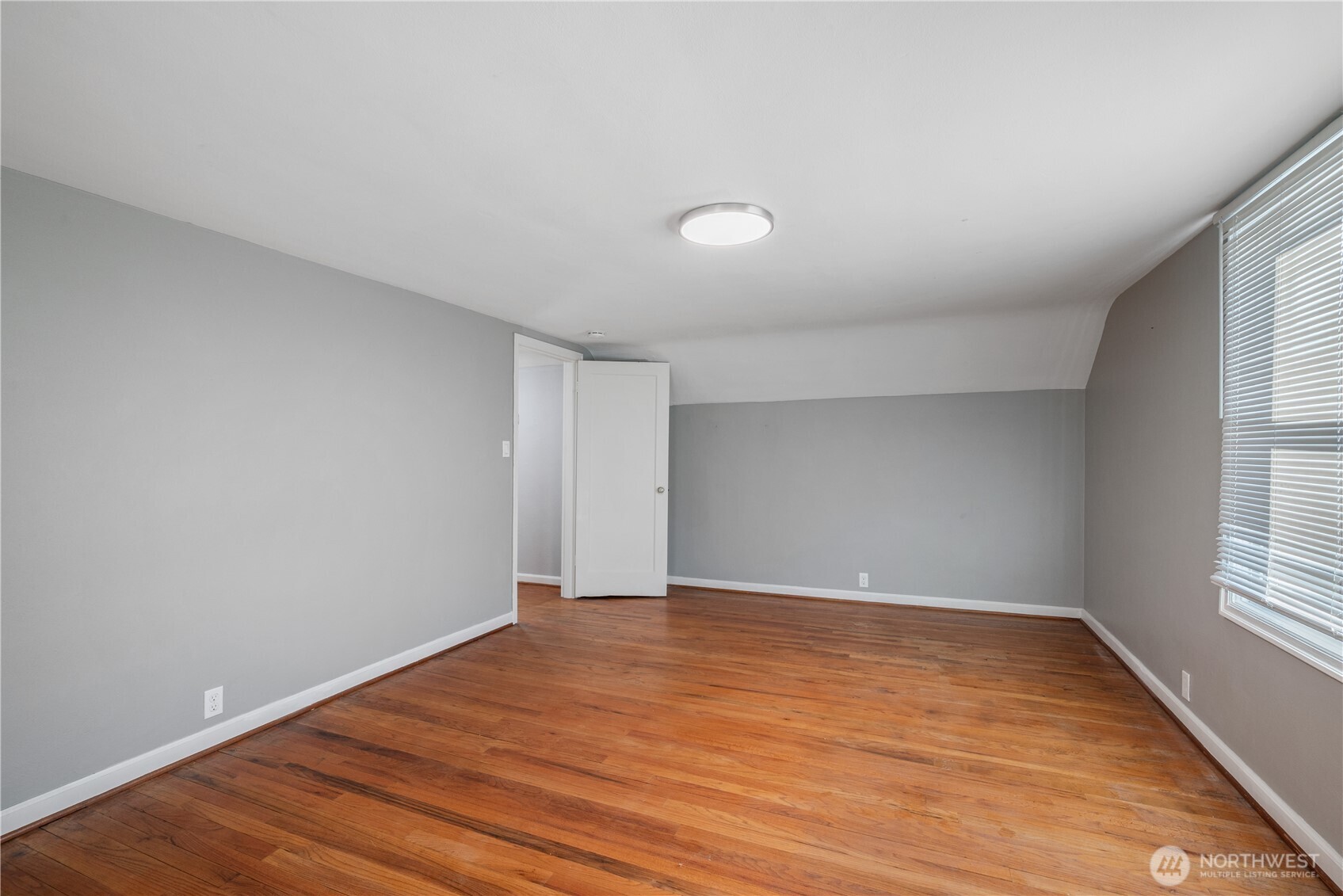 2 Country Club Drive Longview, WA 98632 - Photo 19 of 40 wooden floor in an empty room with a window