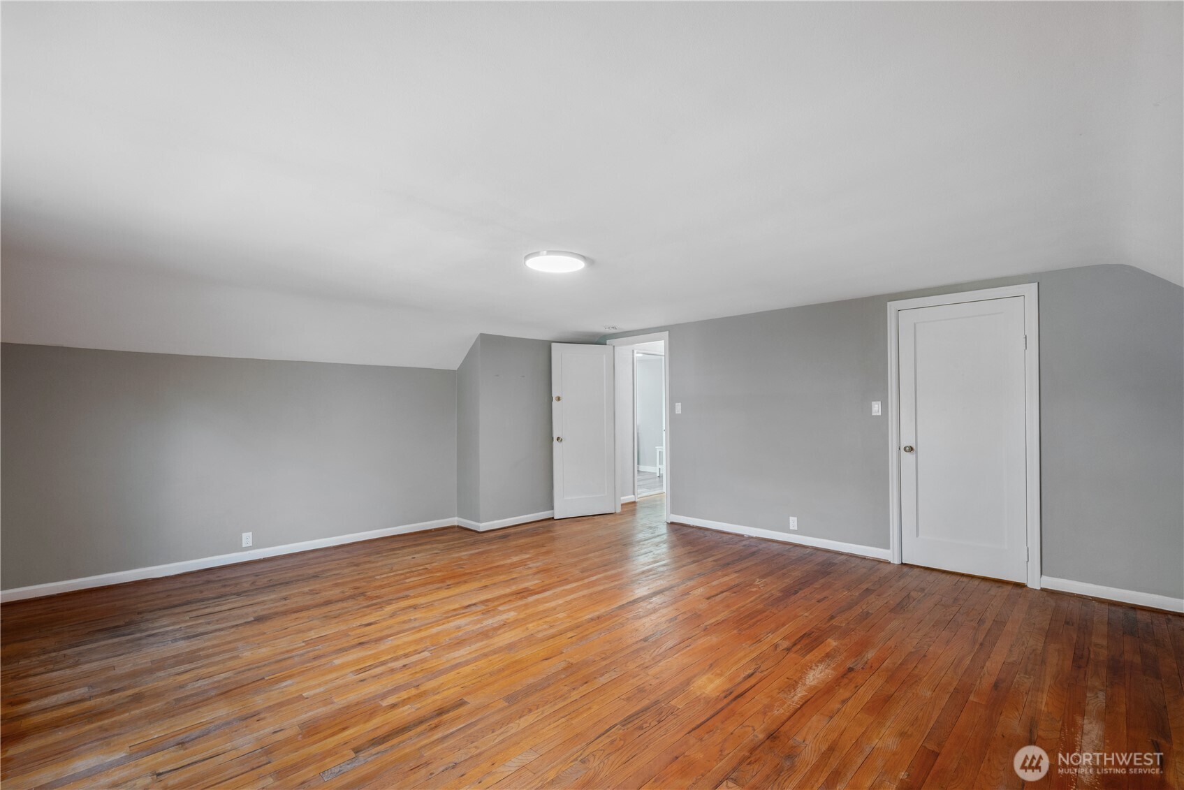 2 Country Club Drive Longview, WA 98632 - Photo 22 of 40 a view of an empty room with wooden floor