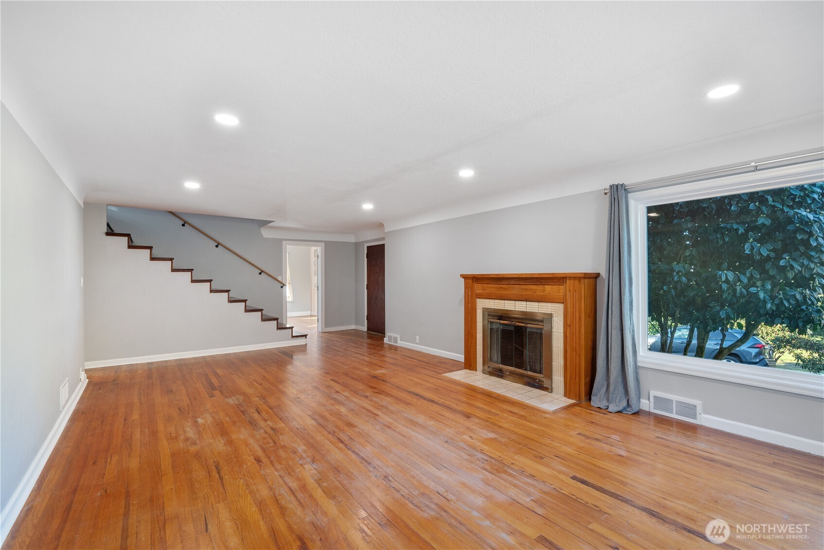 2 Country Club Drive Longview, WA 98632 - Photo 7 of 40 wooden floor in an empty room with a fireplace