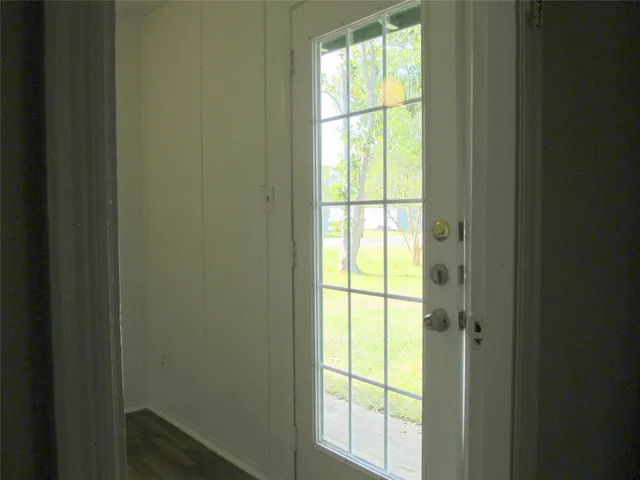 a view of an entryway with a window