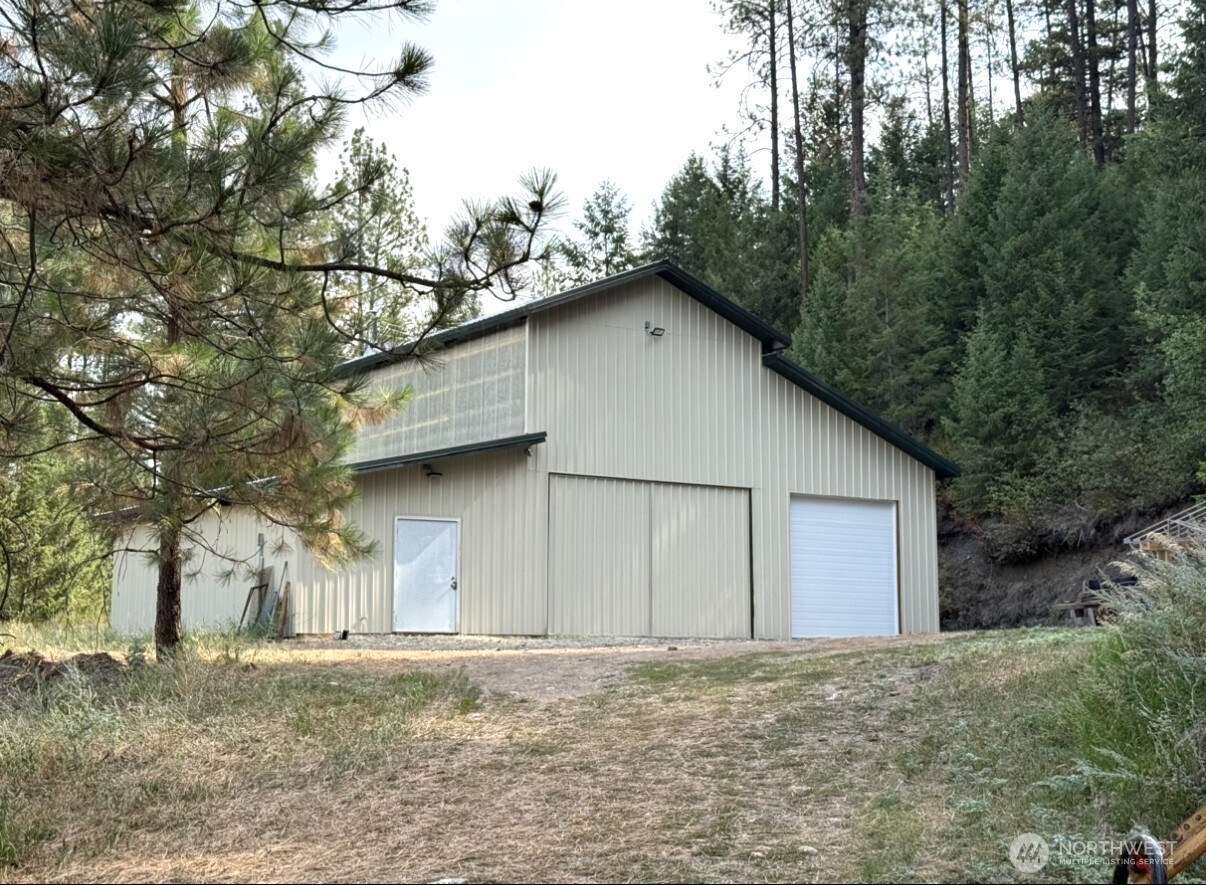 30543 State Rte 20 Republic, WA 99166 - Photo 4 of 20 a house with trees in the background