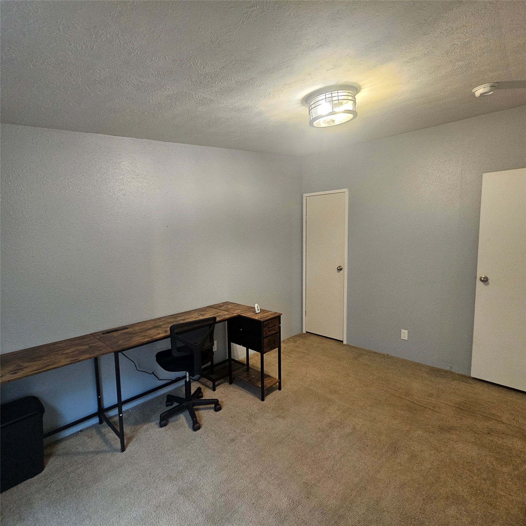 139 Malcom Street Ames, TX 77575 - Photo 18 of 26 a view of a workspace