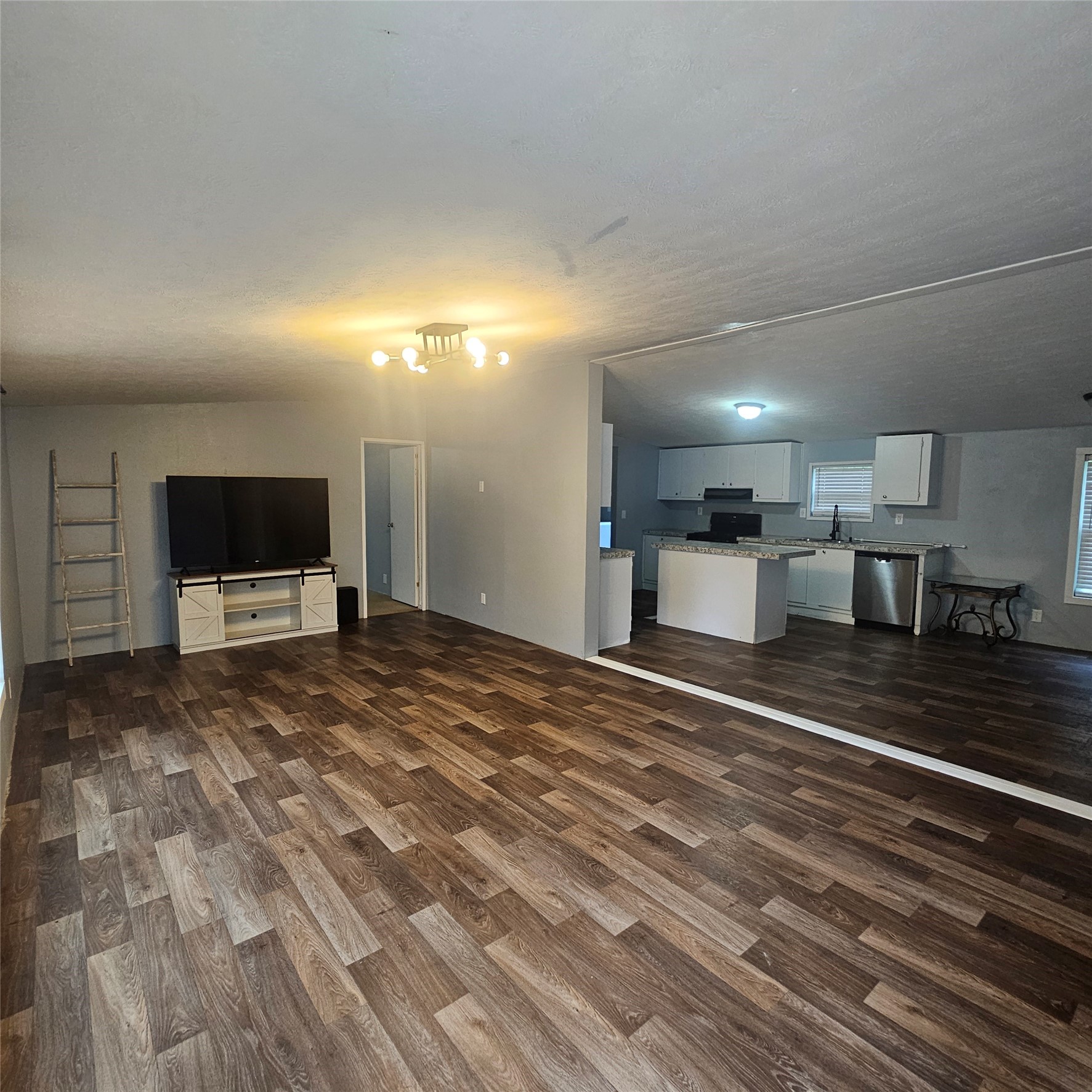 139 Malcom Street Ames, TX 77575 - Photo 25 of 26 a view of a livingroom with a furniture