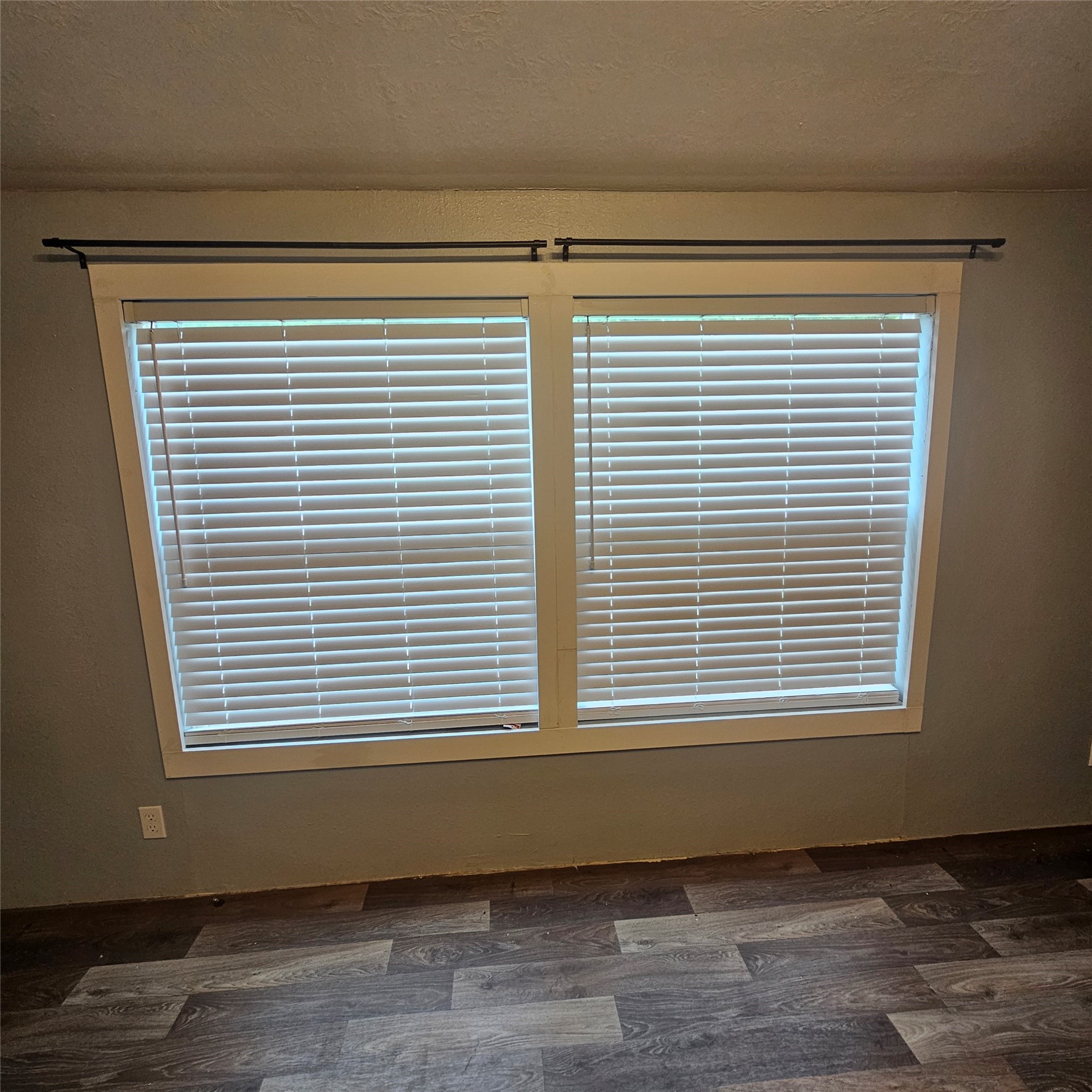 139 Malcom Street Ames, TX 77575 - Photo 7 of 26 a view of a room that has a window in it