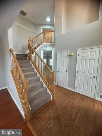 a view of a hallway with staircase