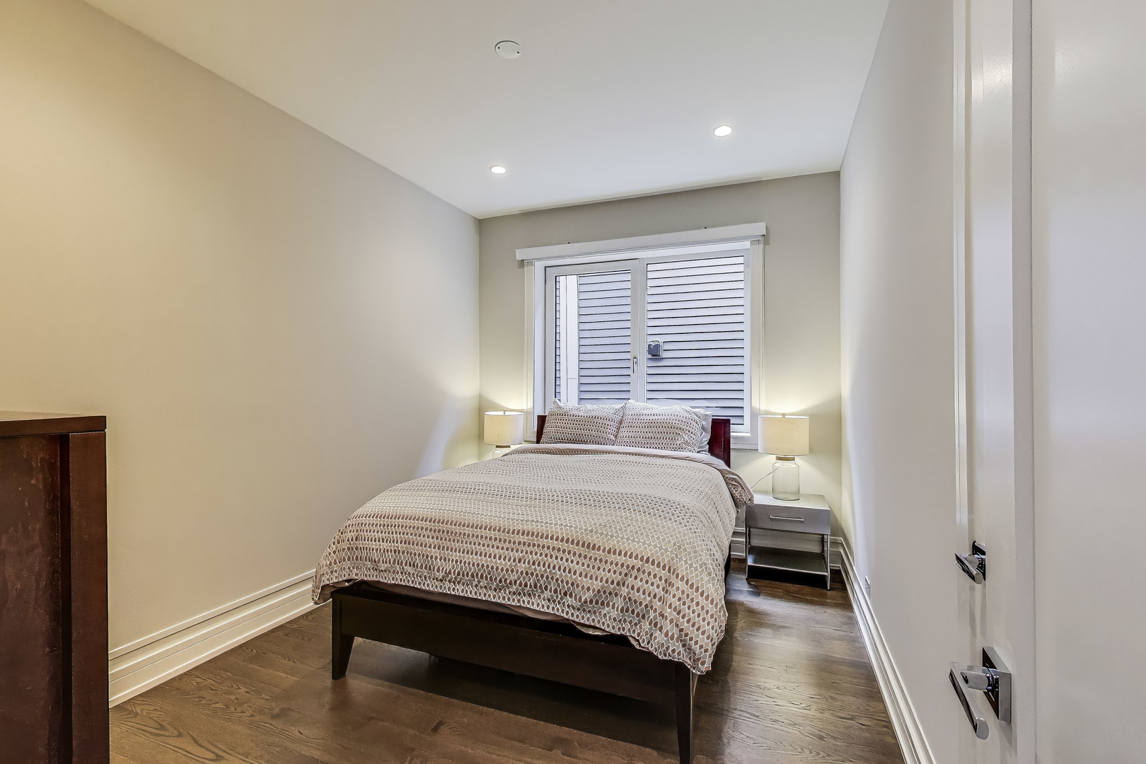 1474 West Ohio Street, Unit 1 Chicago, IL 60642 - Photo 14 of 37 a bedroom with a bed and a window