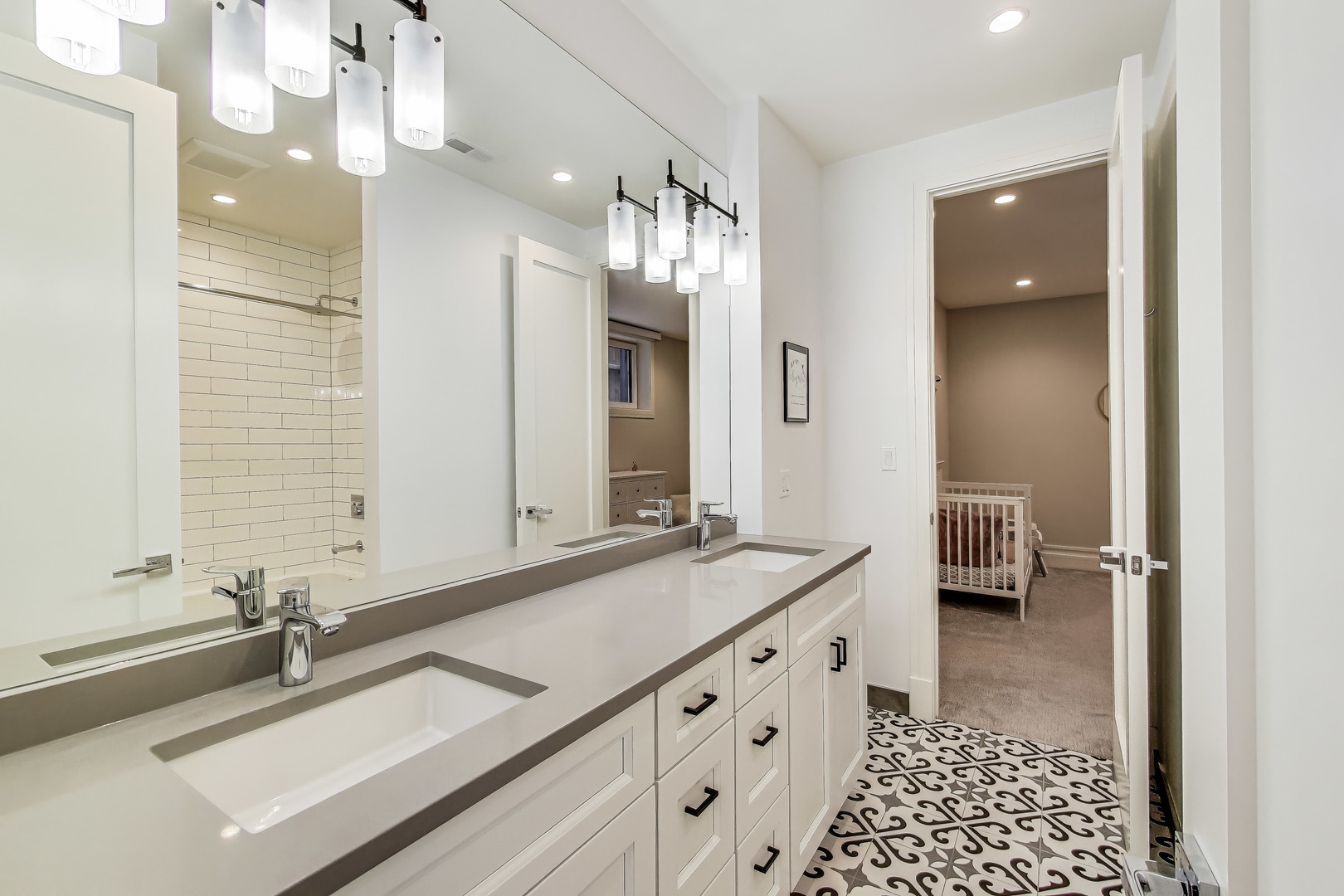 1474 West Ohio Street, Unit 1 Chicago, IL 60642 - Photo 24 of 37 a bathroom with a sink and a mirror
