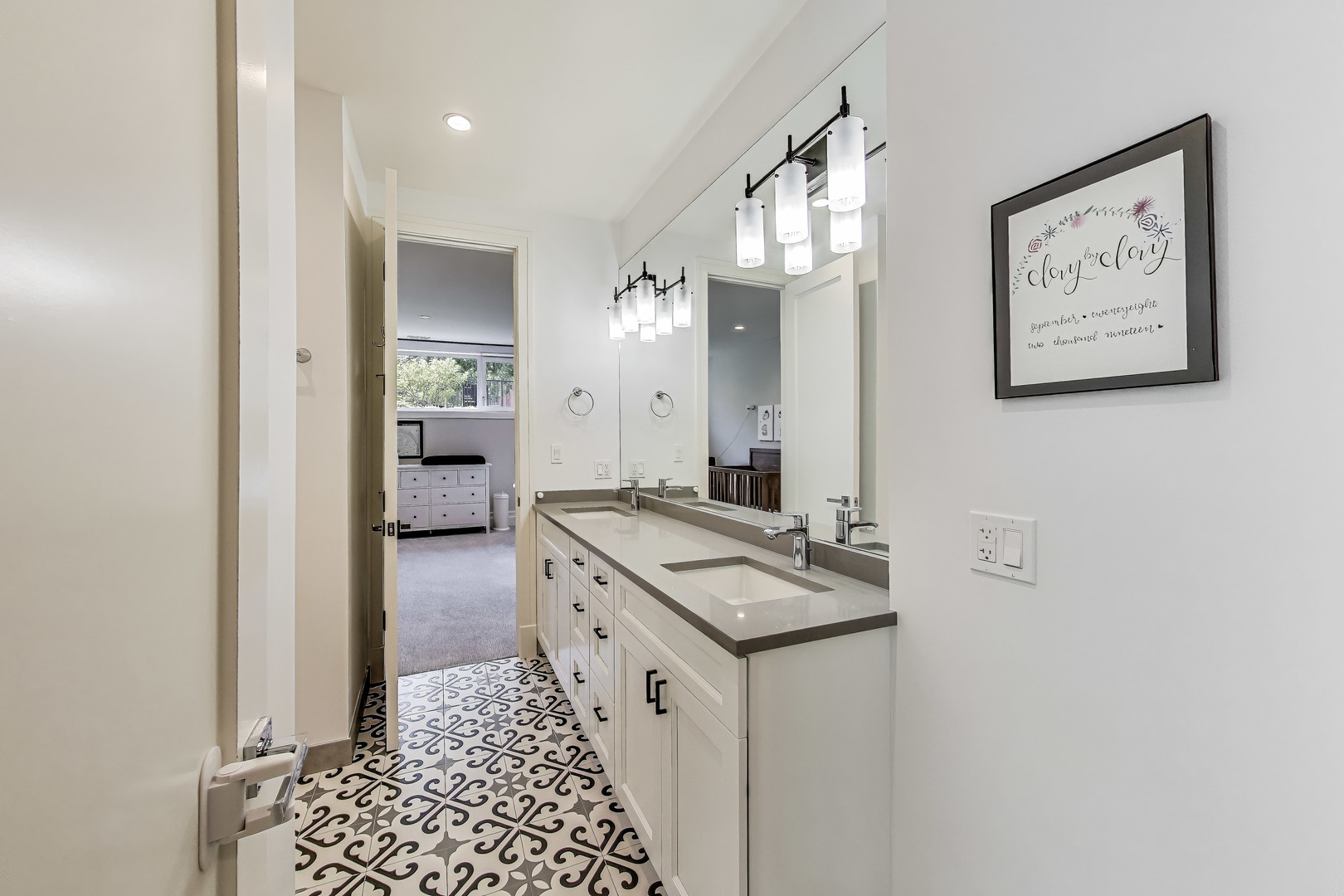 1474 West Ohio Street, Unit 1 Chicago, IL 60642 - Photo 25 of 37 a kitchen with a sink stove and cabinets