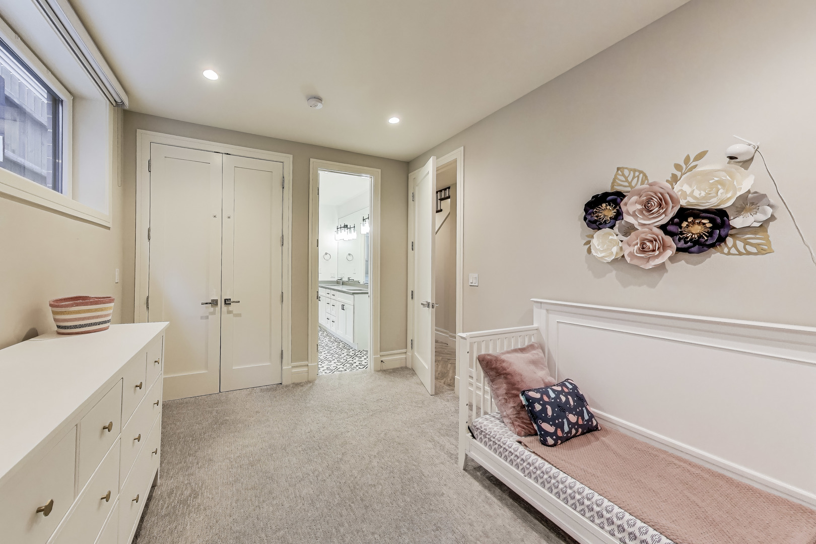 1474 West Ohio Street, Unit 1 Chicago, IL 60642 - Photo 28 of 37 a living room with furniture and a chandelier