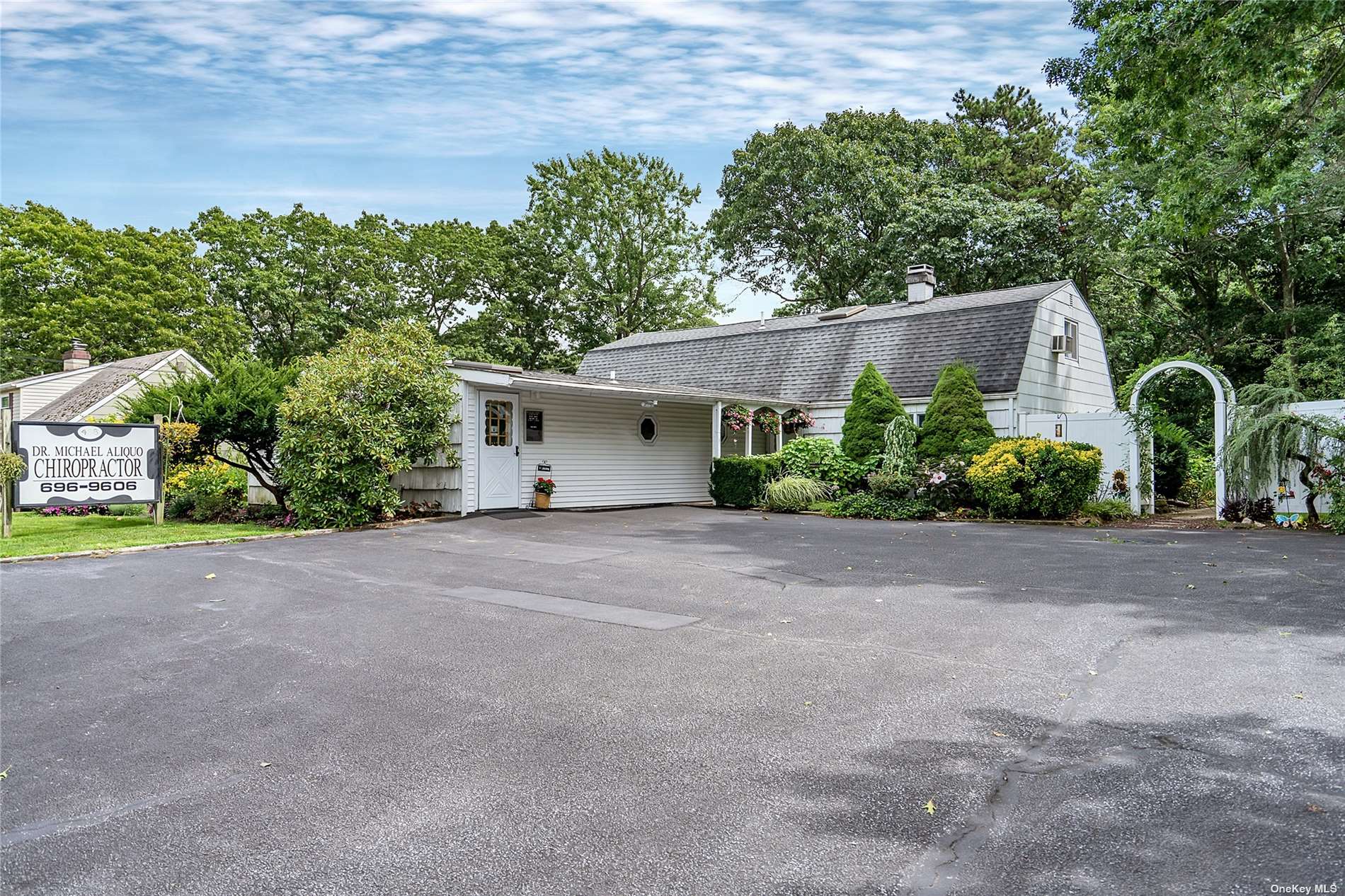a view of a house with a street