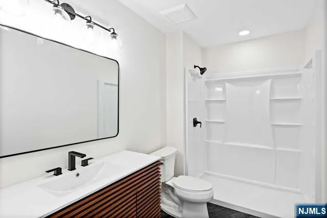 a close view of a sink and dryer