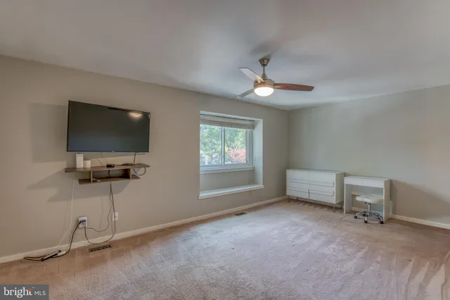 a view of livingroom with furniture and window