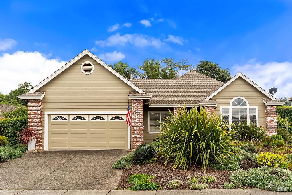 6252 Meadowstone Drive Santa Rosa, CA 95409 - Photo 12 of 33 a front view of a house with a garden