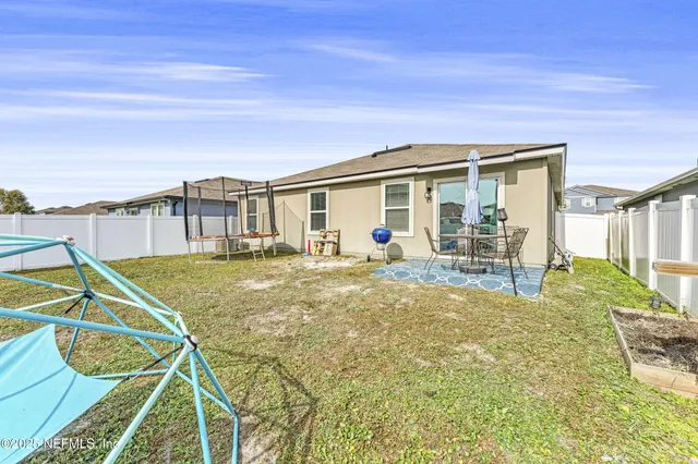 a front view of a house with patio