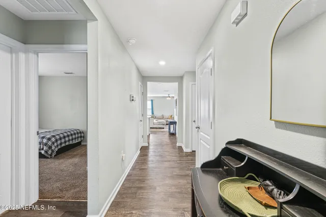 a room with furniture and a wooden floor
