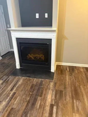 a living room with a fireplace