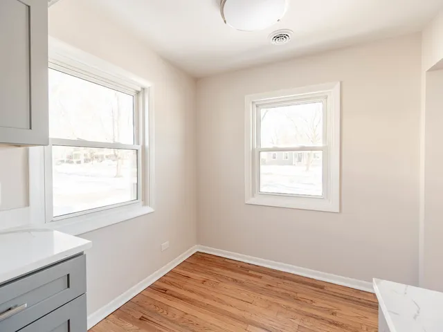 a view of a room that has a window in it