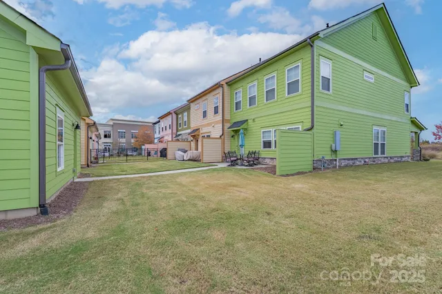 a view of a building with a yard