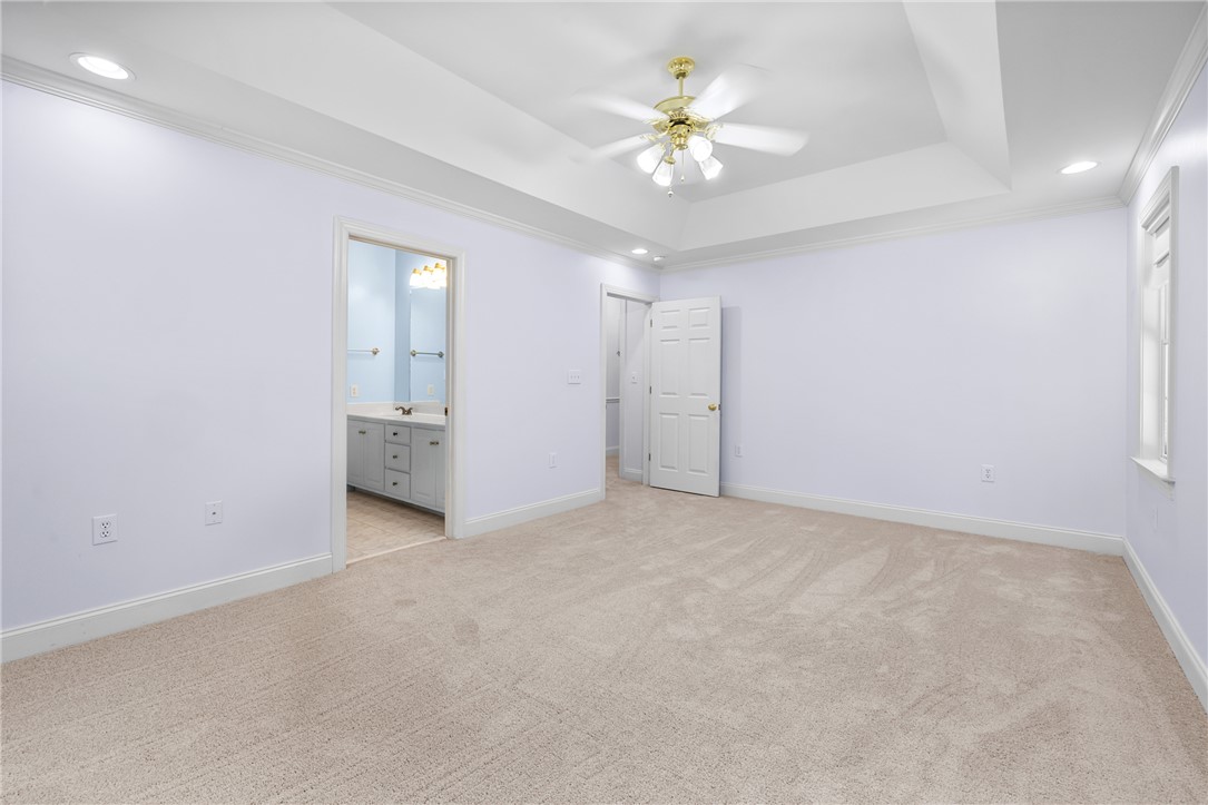 110 Brookstone Way Central, SC 29630 - Photo 22 of 46 This spacious bedroom offers ample comfort and direct access to a well-appointed bathroom.