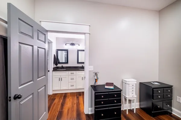 a kitchen with a stove and cabinets