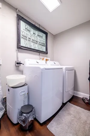a room with a refrigerator and a stove