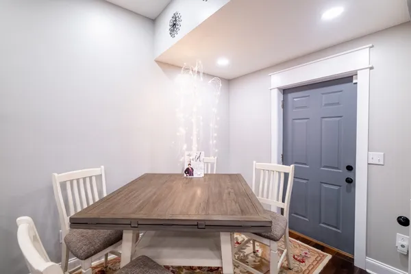 a view of a dining room with furniture